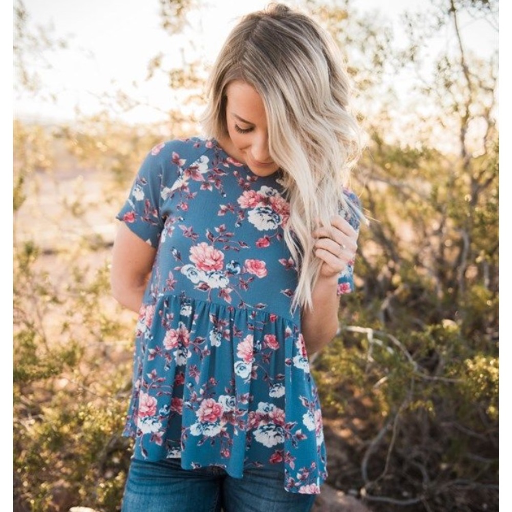 Ashley Lemieux peplum top